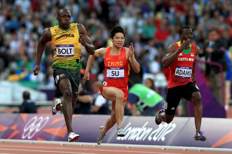 Illustration for article titled Photos Of Usain Bolt Looking Bored As He Blows Past The Best Runners In The World